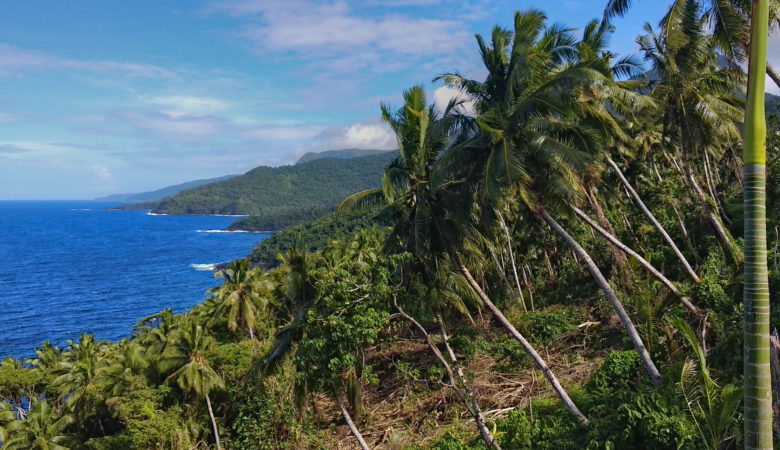 The pointy finger like rock outcropping in the distance is our destination.